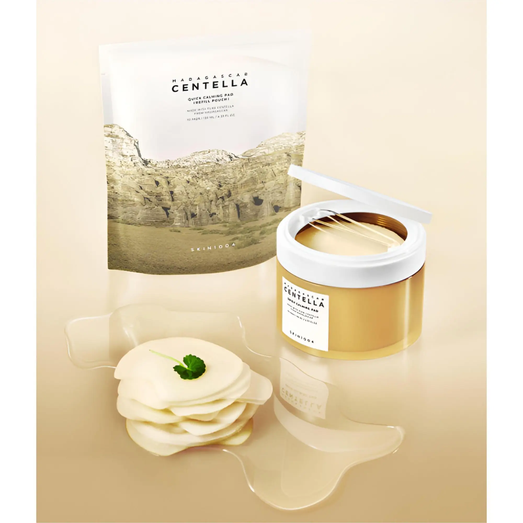 مجموعه پد تسکین دهنده پوست اسکین 1004 مدل Centella Quick Calming به همراه Refill